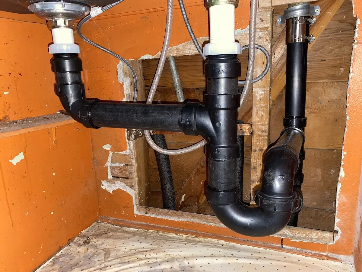 Professional Garbage Disposal Repair equipment and tools on the job in Buchanan